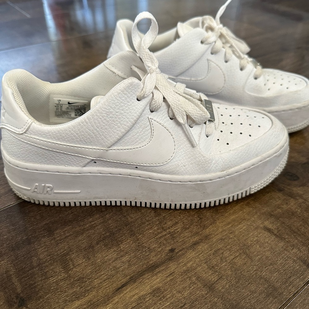 White Nike women’s Air Force 1’s. Size 7